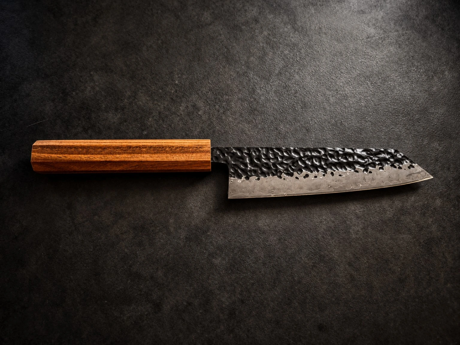 Finished knife — warm reddish-brown wood handle