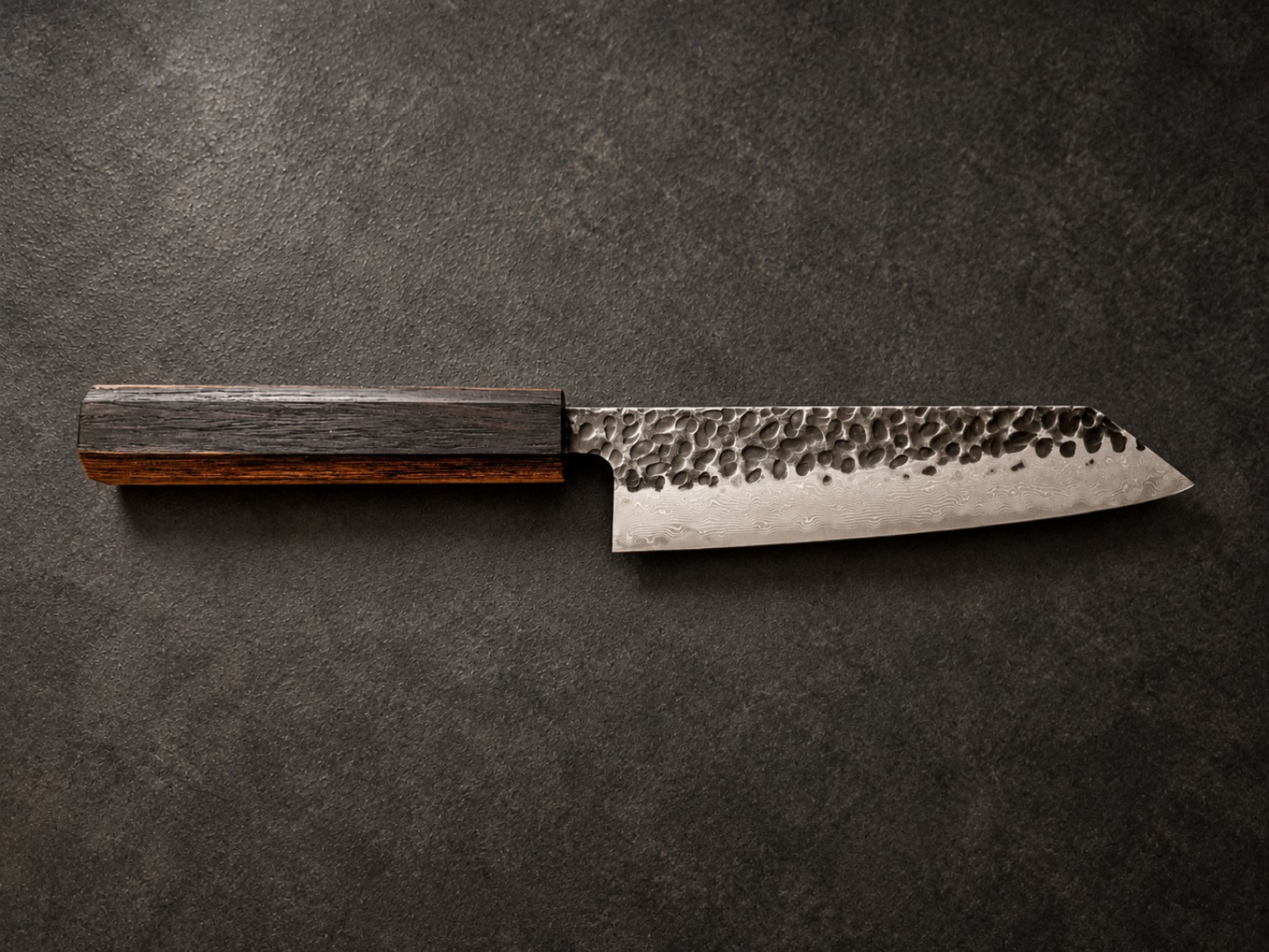 Complete Bunka-style kitchen knife with dark Wenge heartwood and amber-toned sapwood handle, hammered Damascus-finished blade